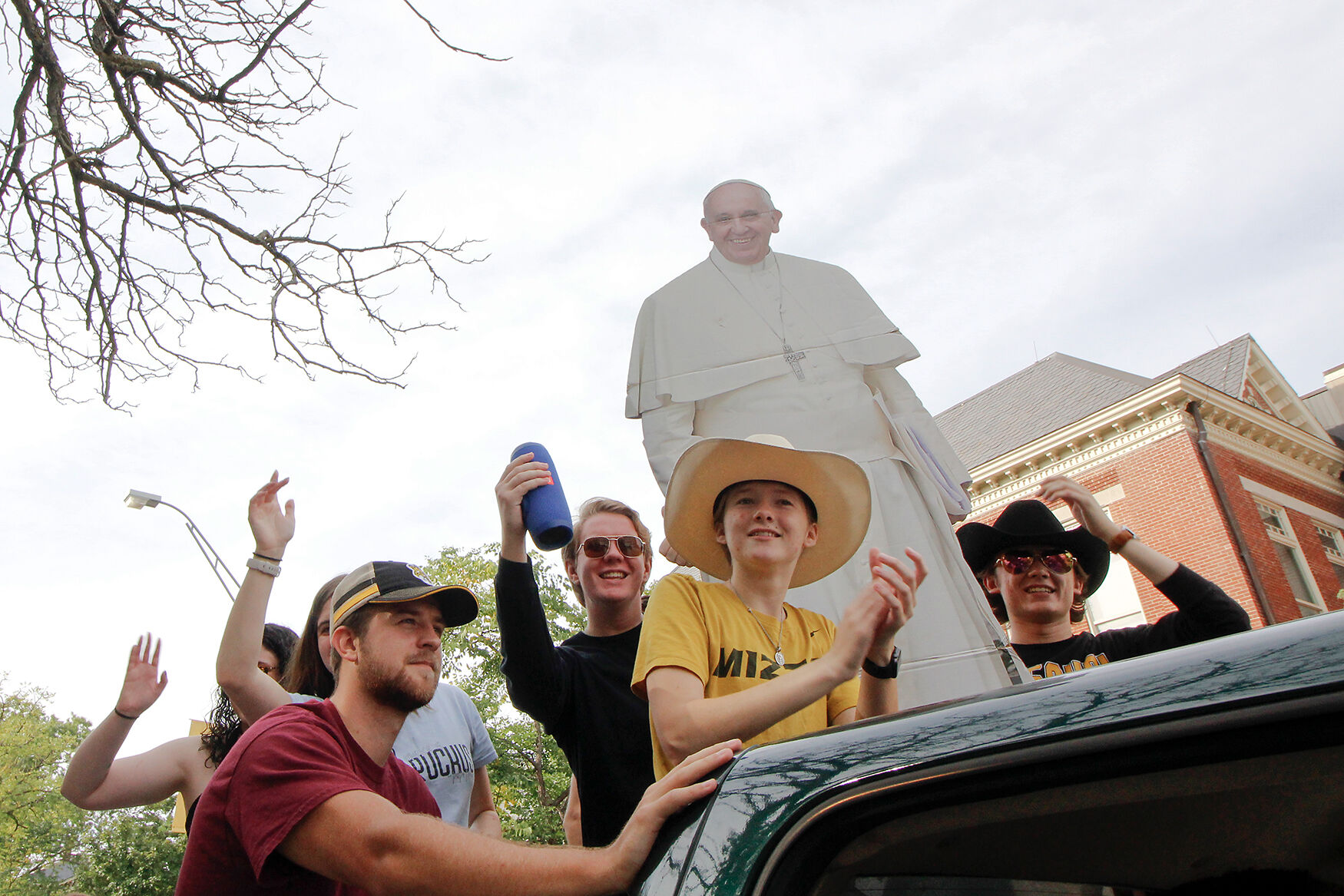 The MU Catholic Association marches in the Homecoming parade